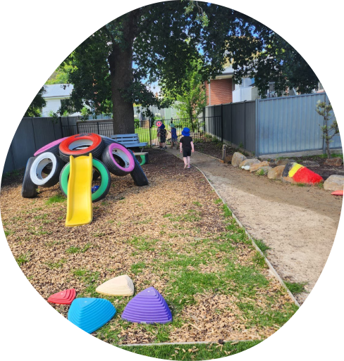 Real-grass outdoor play area at Buninyong Childcare Centre
